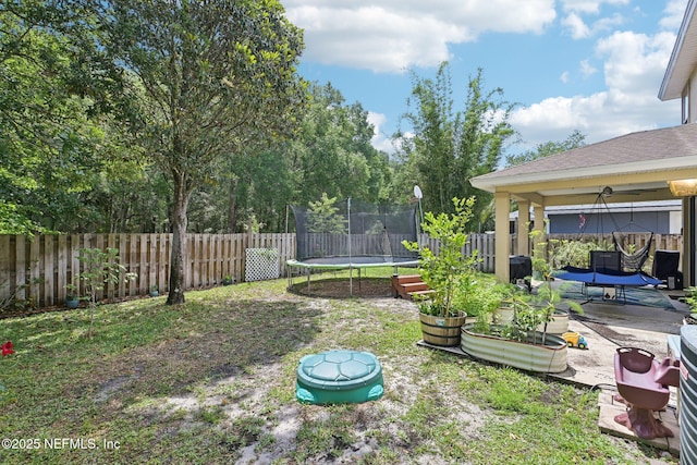 3367 Turkey Creek Dr, Green Cove Springs, FL 32043 - view of yard featuring a trampoline and a patio
