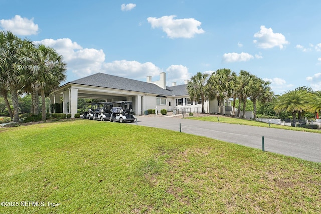 3367 Turkey Creek Dr, Green Cove Springs, FL 32043 - view of green lawn with concrete driveway and an attached garage