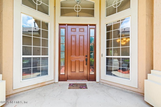 entrance to property featuring a porch
