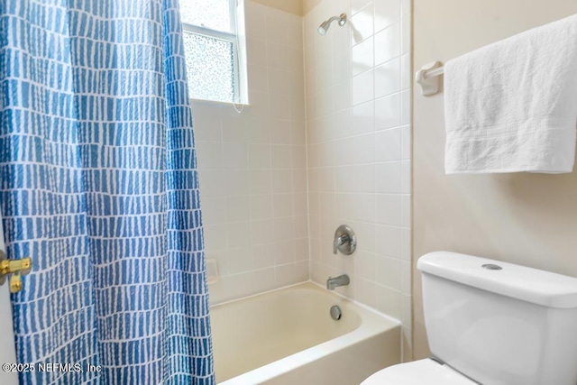full bath featuring toilet and shower / bath combo