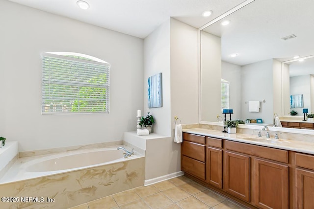 bathroom featuring a bath, tile patterned flooring, vanity, and recessed lighting