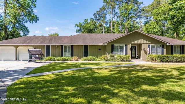 11136 River Creek Dr W, Jacksonville, FL 32223 - single story home featuring a front lawn, an attached garage, and concrete driveway