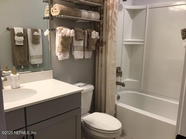 11104 Motion Ct, Jacksonville, FL 32256 - full bath with vanity, shower / bath combo, and toilet
