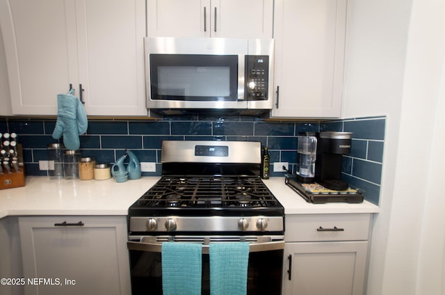 11104 Motion Ct, Jacksonville, FL 32256 - kitchen with light countertops, decorative backsplash, and stainless steel appliances