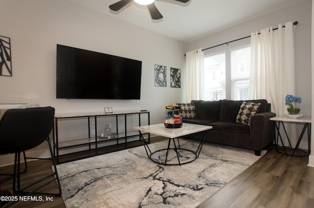 11104 Motion Ct, Jacksonville, FL 32256 - living area featuring a ceiling fan and wood finished floors