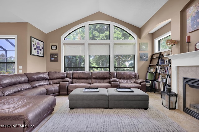 521 S Bridge Creek Dr, Saint Johns, FL 32259 - living area featuring vaulted ceiling and a fireplace with flush hearth