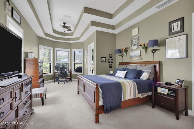521 S Bridge Creek Dr, Saint Johns, FL 32259 - bedroom with light carpet, a raised ceiling, a desk, and baseboards