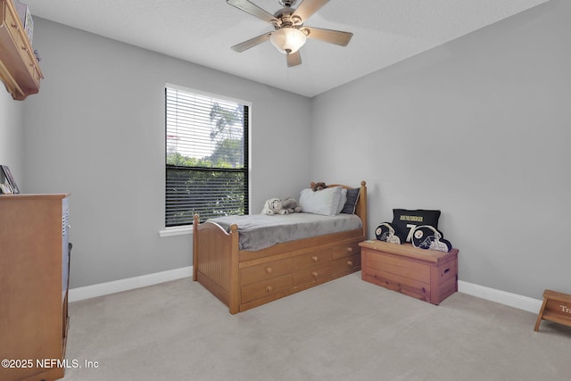 521 S Bridge Creek Dr, Saint Johns, FL 32259 - bedroom with baseboards, light carpet, and a ceiling fan