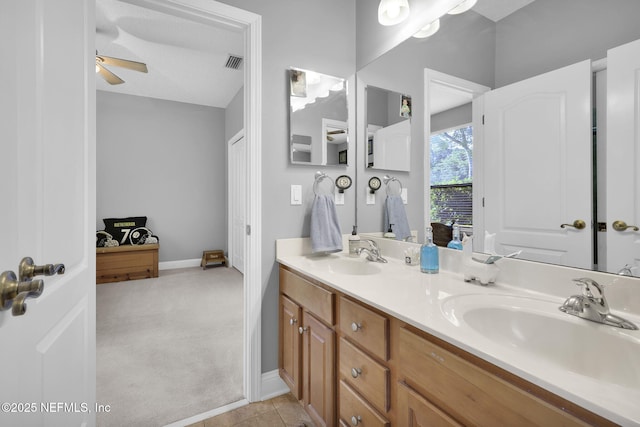 521 S Bridge Creek Dr, Saint Johns, FL 32259 - full bathroom featuring double vanity, ceiling fan, and baseboards