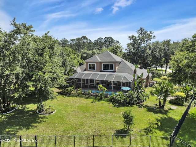 521 S Bridge Creek Dr, Saint Johns, FL 32259 - back of property with a lanai and view of scattered trees