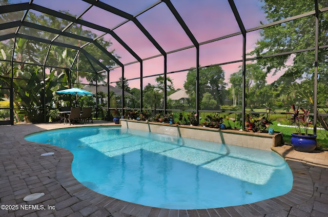 521 S Bridge Creek Dr, Saint Johns, FL 32259 - swimming pool with a patio, outdoor dining area, and glass enclosure