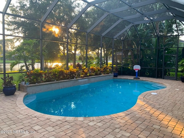 521 S Bridge Creek Dr, Saint Johns, FL 32259 - outdoor pool featuring a patio and glass enclosure