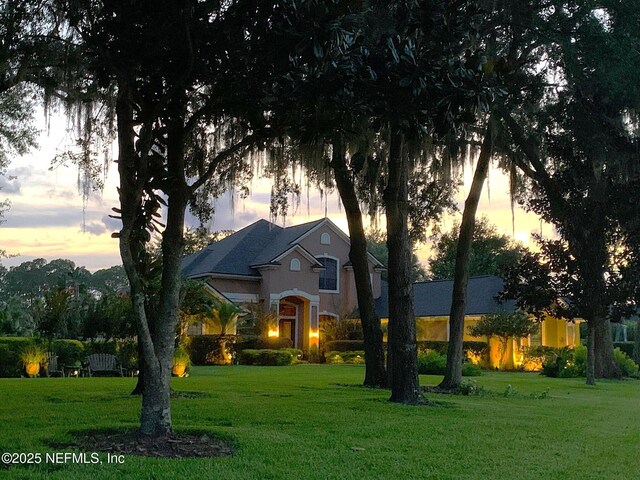 521 S Bridge Creek Dr, Saint Johns, FL 32259 - view of front facade featuring a front lawn