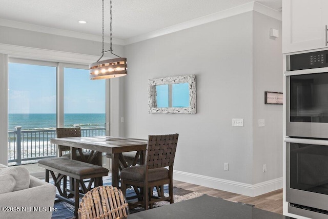 3083 S Ponte Vedra Blvd, Ponte Vedra Beach, FL 32082 - dining room with healthy amount of natural light, light wood finished floors, baseboards, a water view, and recessed lighting
