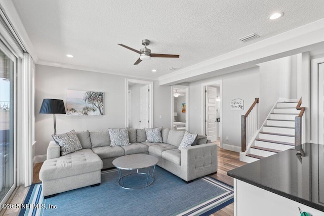 3083 S Ponte Vedra Blvd, Ponte Vedra Beach, FL 32082 - living area with wood finished floors, a ceiling fan, a textured ceiling, stairs, and recessed lighting