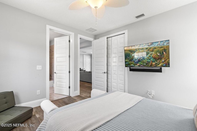 3083 S Ponte Vedra Blvd, Ponte Vedra Beach, FL 32082 - bedroom with wood finished floors, a closet, baseboards, and a ceiling fan