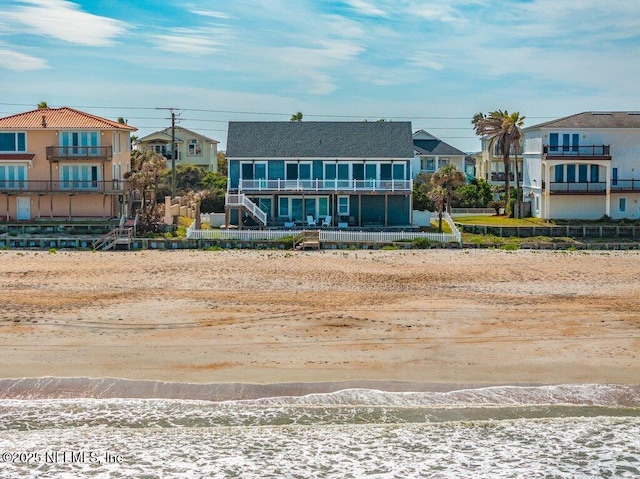 3083 S Ponte Vedra Blvd, Ponte Vedra Beach, FL 32082 - view of front of property with a view of the beach and a balcony