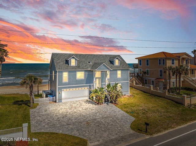 3083 S Ponte Vedra Blvd, Ponte Vedra Beach, FL 32082 - view of front of home with decorative driveway and an attached garage