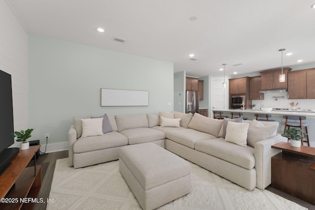 55 Rainbow Trout Ln, Ponte Vedra, FL 32081 - living room with light wood-type flooring, recessed lighting, and baseboards