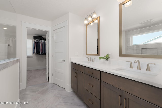 55 Rainbow Trout Ln, Ponte Vedra, FL 32081 - bathroom with a walk in closet, double vanity, and a shower