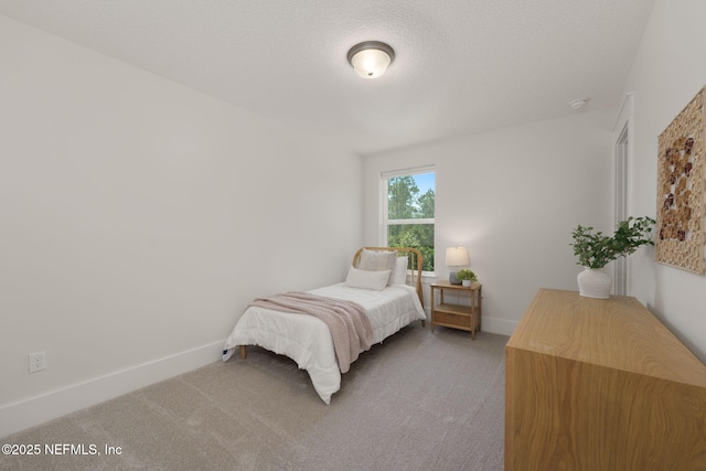 55 Rainbow Trout Ln, Ponte Vedra, FL 32081 - carpeted bedroom with baseboards and a textured ceiling
