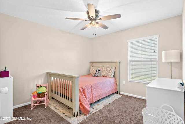 bedroom featuring baseboards, carpet, and a ceiling fan