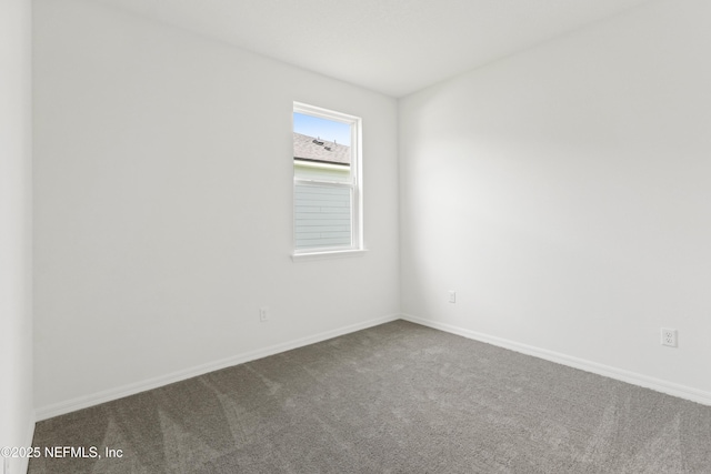 2442 Glade Ln, Green Cove Springs, FL 32043 - carpeted spare room featuring baseboards