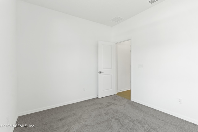 2442 Glade Ln, Green Cove Springs, FL 32043 - carpeted spare room with baseboards