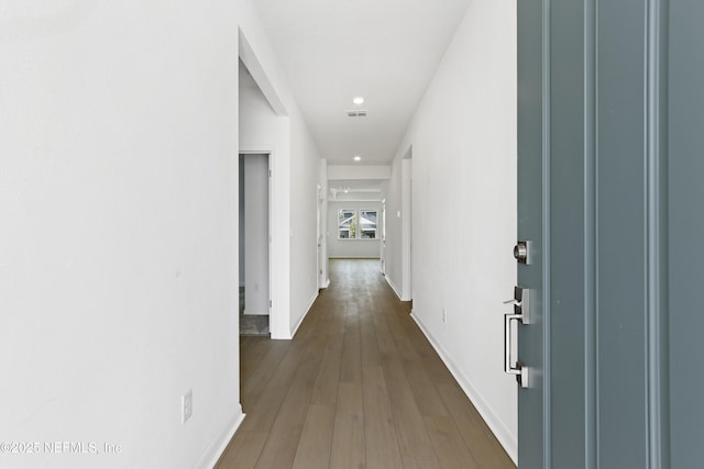2442 Glade Ln, Green Cove Springs, FL 32043 - hallway with baseboards, dark wood-type flooring, and recessed lighting