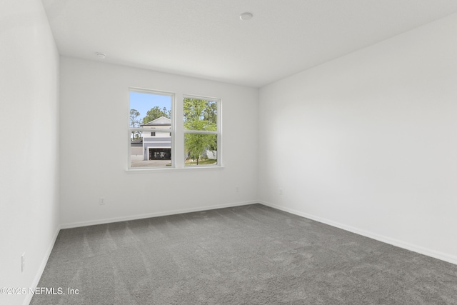 2442 Glade Ln, Green Cove Springs, FL 32043 - empty room with carpet floors and baseboards