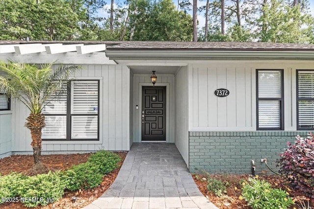 7372 Secret Woods Dr, Jacksonville, FL 32216 - property entrance with brick siding