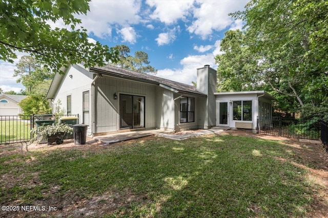 7372 Secret Woods Dr, Jacksonville, FL 32216 - rear view of house featuring a chimney