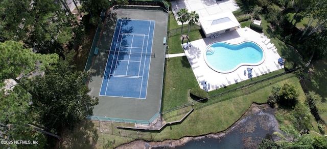 7372 Secret Woods Dr, Jacksonville, FL 32216 - drone / aerial view of a pool area
