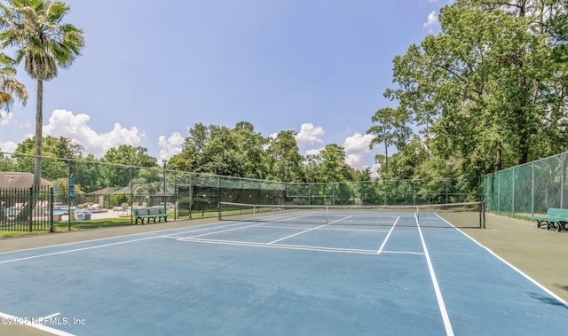 7372 Secret Woods Dr, Jacksonville, FL 32216 - view of tennis court featuring fence and community basketball court