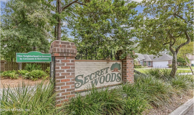 7372 Secret Woods Dr, Jacksonville, FL 32216 - community / neighborhood sign featuring fence