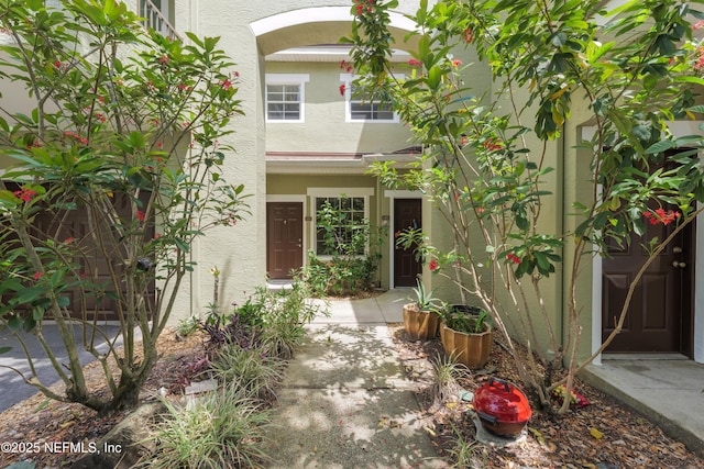 2005 Mariposa Vista Ln Unit 3-123, Saint Augustine, FL 32084 - property entrance with stucco siding