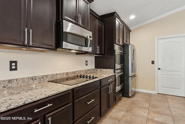 kitchen with dark brown cabinetry, crown molding, appliances with stainless steel finishes, light tile patterned floors, and light stone counters