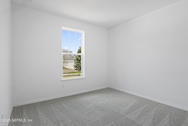 2413 Glade Ln, Green Cove Springs, FL 32043 - carpeted empty room with baseboards