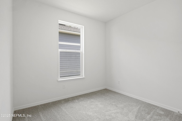 2413 Glade Ln, Green Cove Springs, FL 32043 - carpeted empty room featuring baseboards