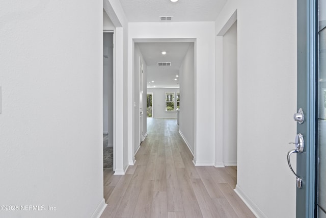 2413 Glade Ln, Green Cove Springs, FL 32043 - hall featuring baseboards, light wood finished floors, and recessed lighting