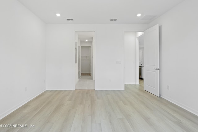 2413 Glade Ln, Green Cove Springs, FL 32043 - unfurnished bedroom featuring light wood finished floors, recessed lighting, and baseboards