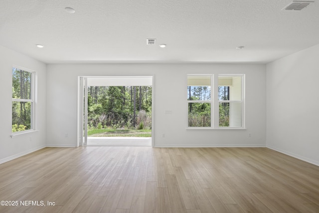 2413 Glade Ln, Green Cove Springs, FL 32043 - unfurnished room with light wood-style floors and baseboards