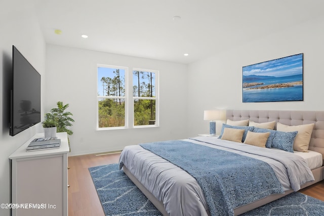 2413 Glade Ln, Green Cove Springs, FL 32043 - bedroom with wood finished floors and recessed lighting