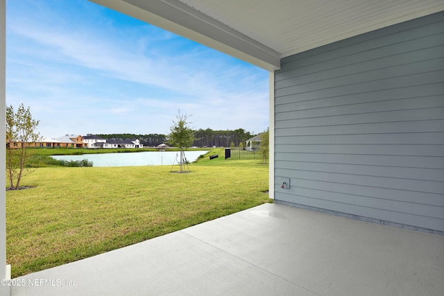 view of patio featuring a water view