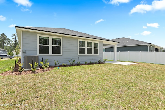 2416 Glade Ln, Green Cove Springs, FL 32043 - rear view of property featuring central AC unit and a patio area