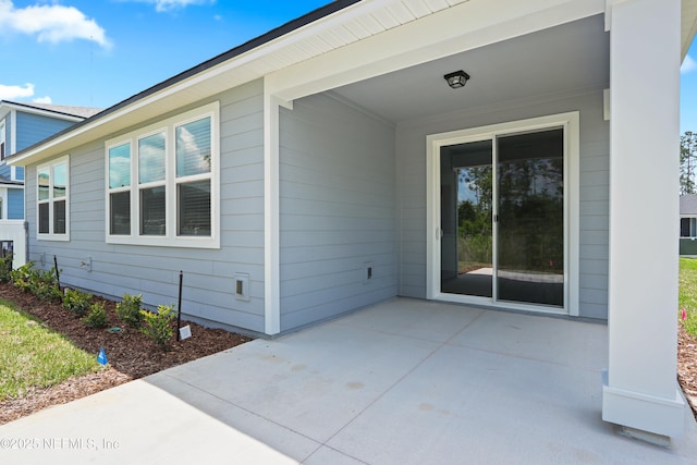2416 Glade Ln, Green Cove Springs, FL 32043 - property entrance featuring a patio area