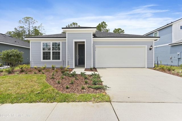 2416 Glade Ln, Green Cove Springs, FL 32043 - view of front of home featuring a garage and concrete driveway
