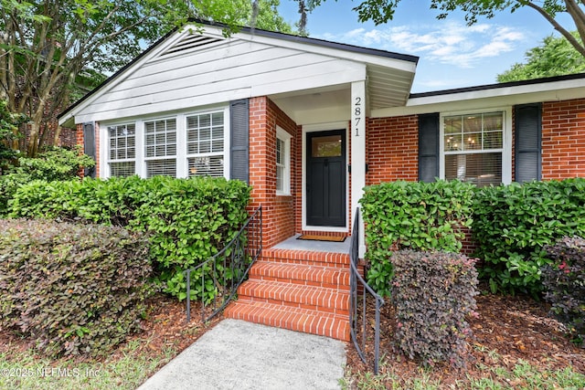 view of front of property with brick siding