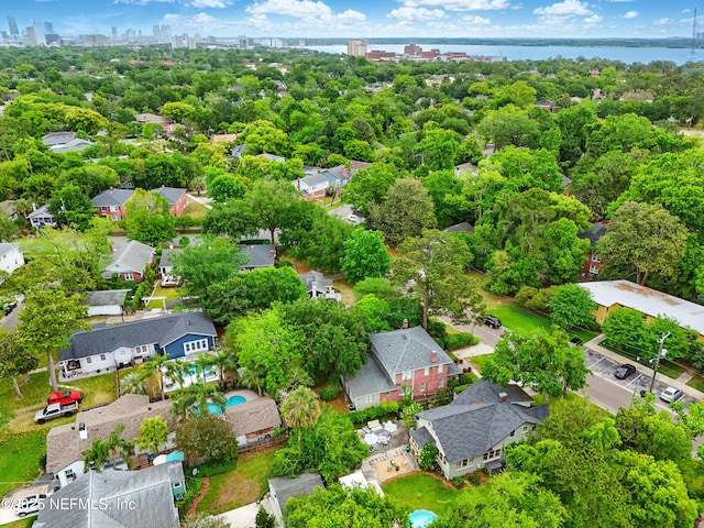 aerial view with a water view, a city view, and a residential view