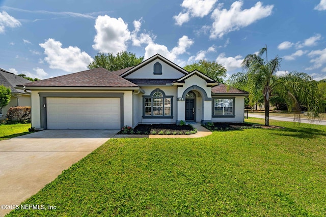 132 Summerhill Cir, Saint Augustine, FL 32086 - view of front facade featuring stucco siding, an attached garage, driveway, a front lawn, and a shingled roof